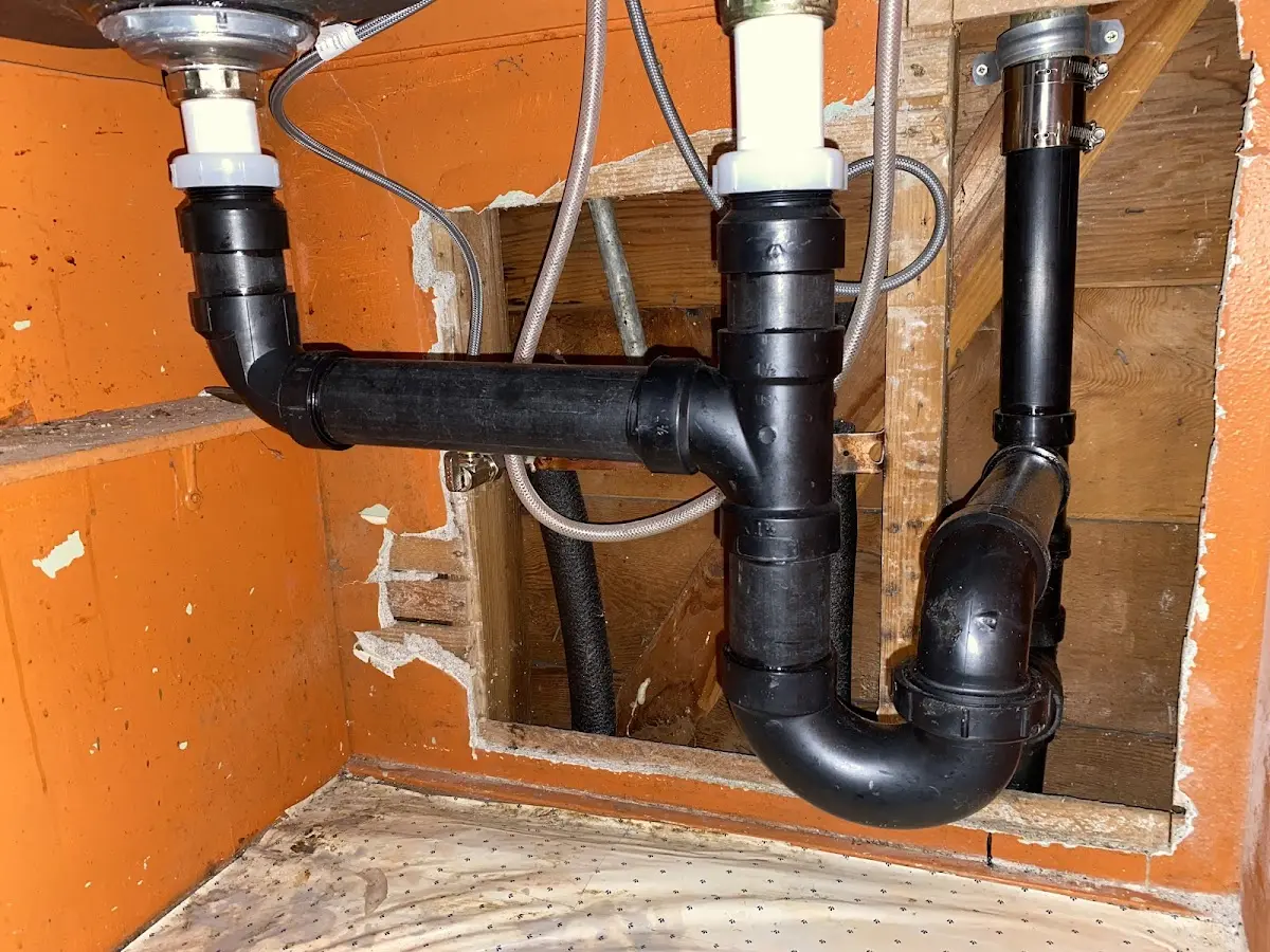 Professional Garbage Disposal Repair equipment and tools on the job in Keene